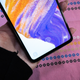 A photo of the Galaxy A53 with emphasis on the fingerprint scanner